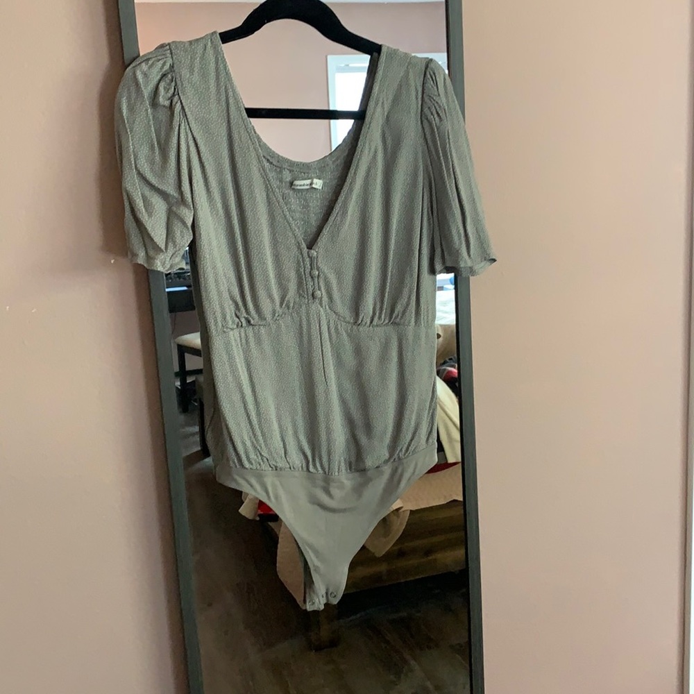 Gray spotted bodysuit top